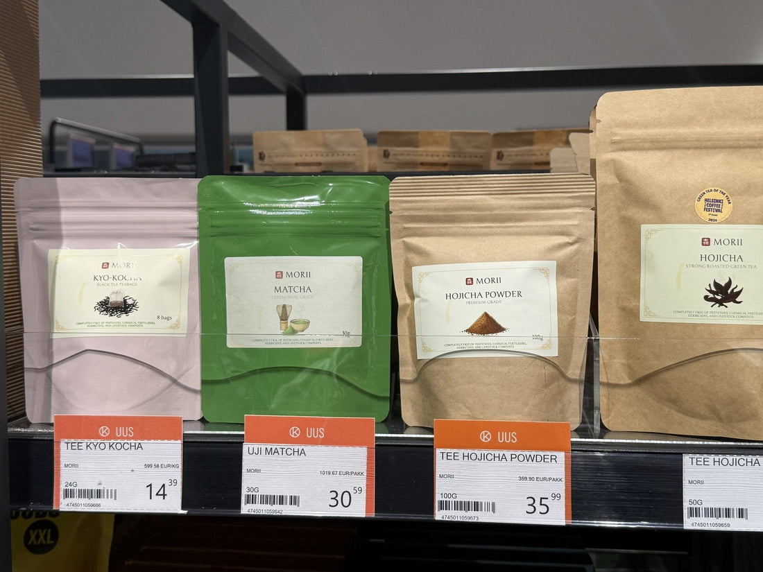 Morii Uji matcha, hojicha powder, hojicha and Kyo-Kocha black tea with price labels on the Kaubamaja Toidumaailm shelf in Tallinn, September 2026