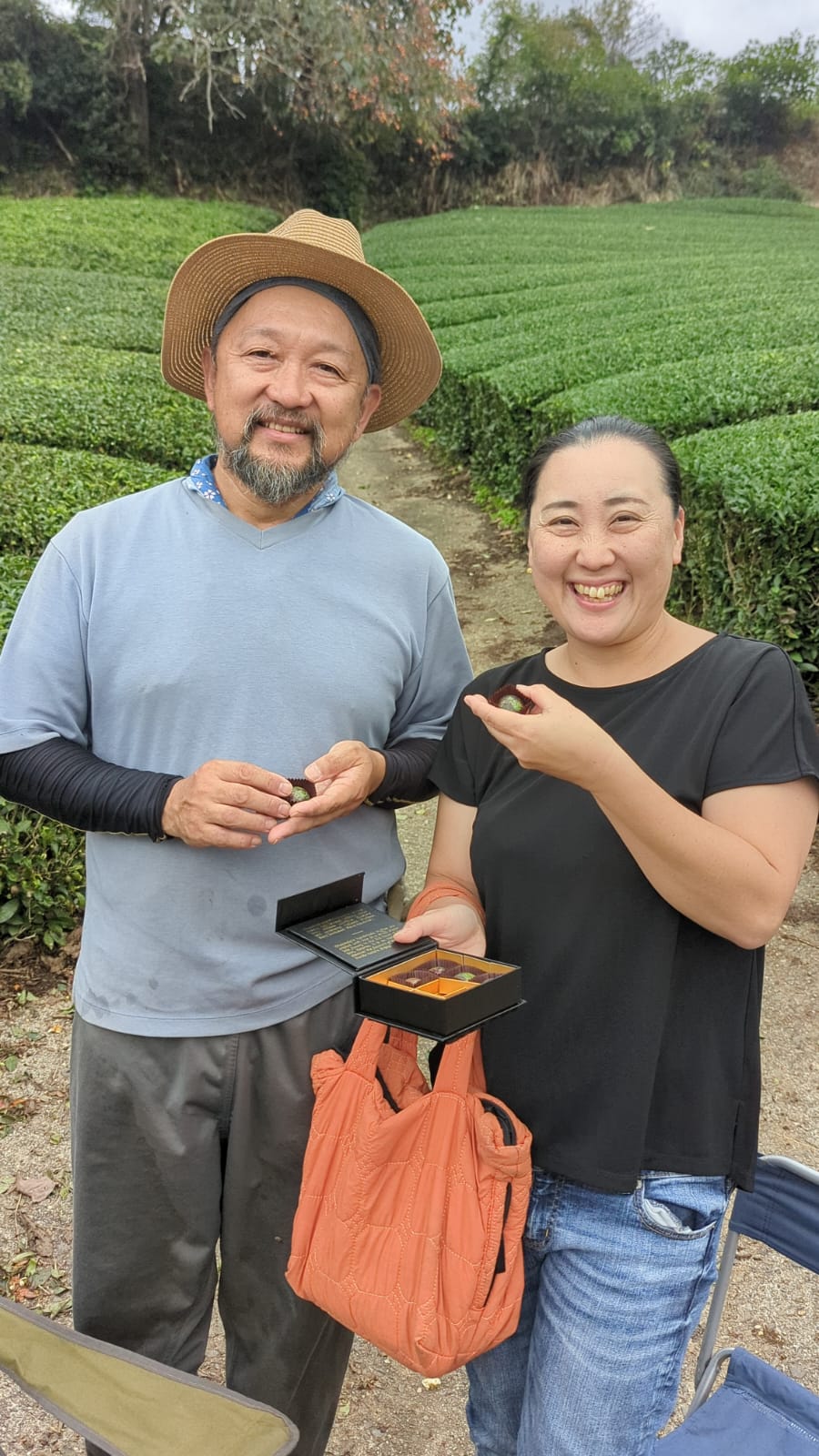 Masakazu Morii and Tomomi Morii in the tea rows at their family farm in Kizugawa, Kyoto